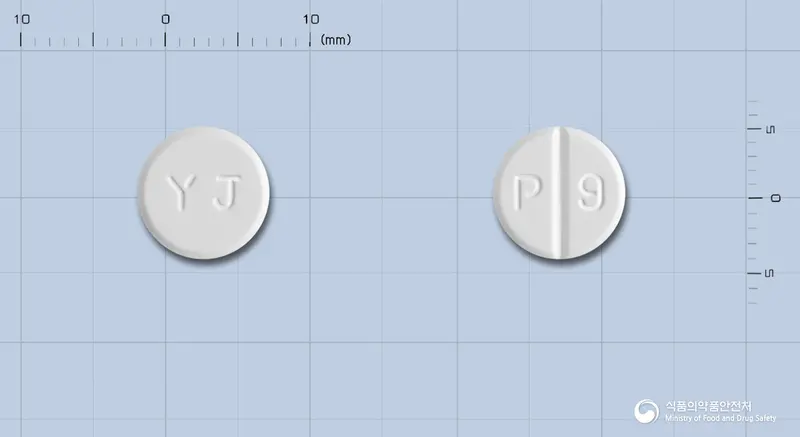 파킨펙솔정1밀리그램(프라미펙솔염산염일수화물) 앞뒤 사진 (흰색 원형, 각인 YJ / P 9)