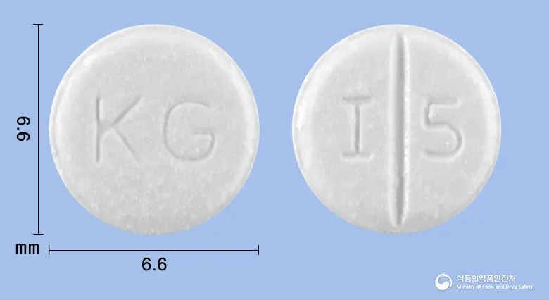 글로디올정(카르베딜롤) 앞뒤 사진 (흰색 원형, 각인 KG / I 5)