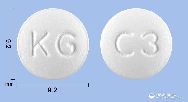 글록신정(록시트로마이신) 앞뒤 사진 (흰색 원형, 각인 KG / C3)