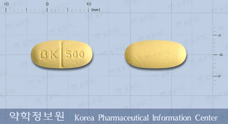 레비큐어정500밀리그램(레비티라세탐) 앞뒤 사진 (노란색 타원형, 각인 BK 500)