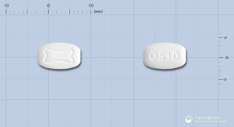 오스플러스디정 앞뒤 사진 (흰색 타원형, 각인 OS+D)