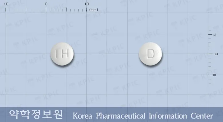 돔페리움엠정(돔페리돈말레산염)(수출명: Welldom-K Tab.) 앞뒤 사진 (흰색 원형, 각인 IH / D)