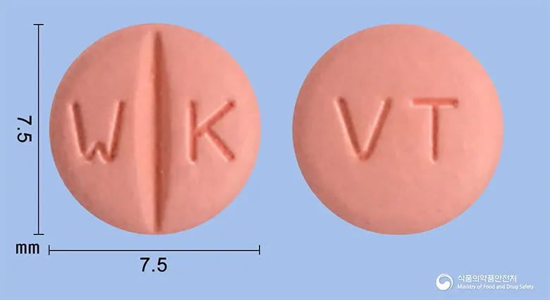 뉴사탄정80밀리그램(발사르탄) 앞뒤 사진 (분홍색 원형, 각인 W K / VT)