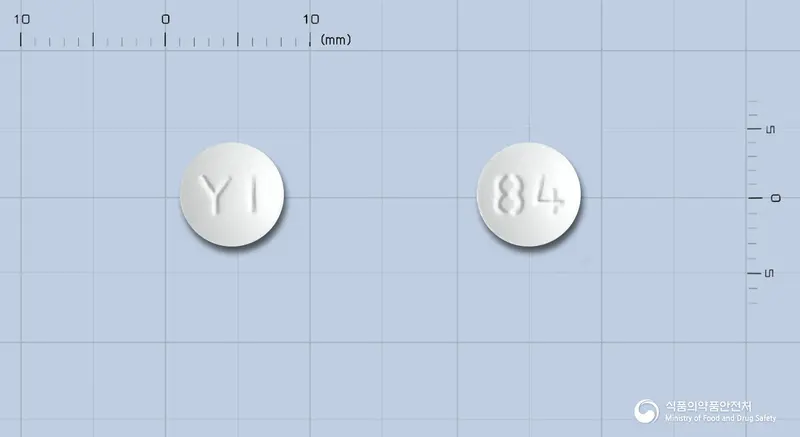알로페낙정(아세클로페낙) 앞뒤 사진 (흰색 원형, 각인 YI / 84)