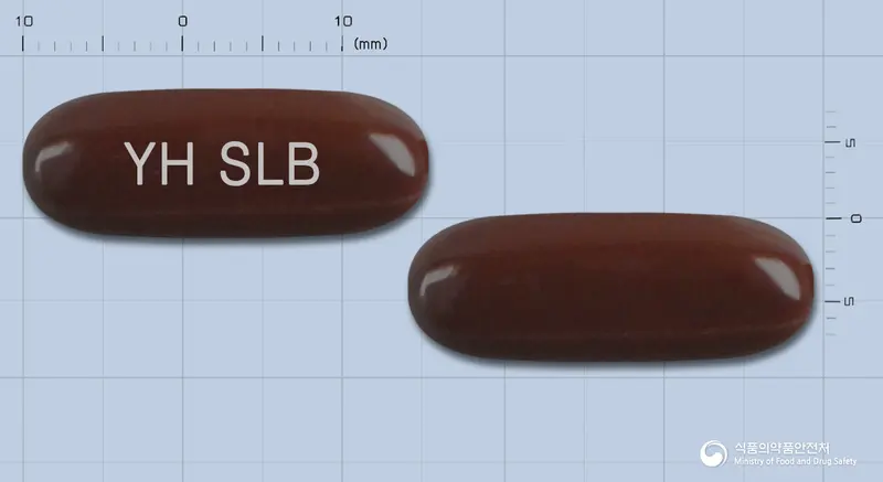 셀렌비연질캡슐 앞뒤 사진 (갈색 캡슐, 각인 YH SLB)