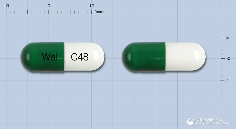 란소텍캡슐30밀리그램(란소프라졸) 앞뒤 사진 (초록색 캡슐, 각인 Wal C48)