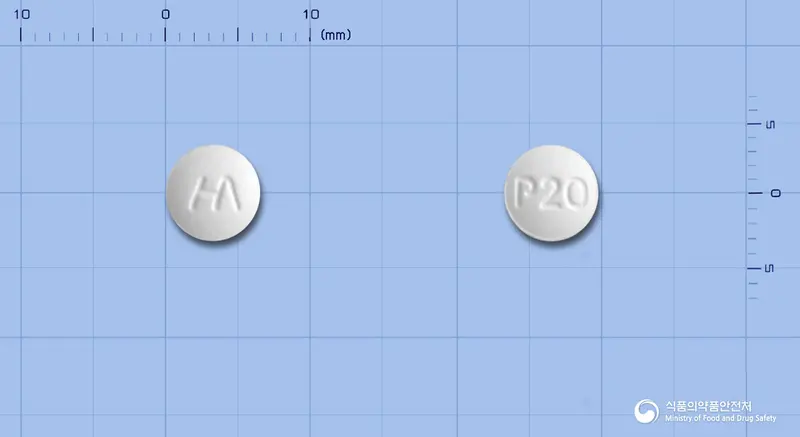 파데나필정20밀리그램(실데나필시트르산염) 앞뒤 사진 (흰색 원형, 각인 P20)
