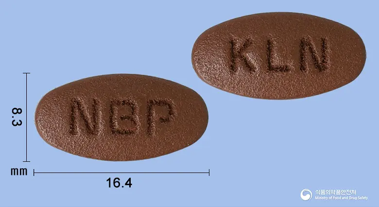 뉴트리-비프리미엄정 앞뒤 사진 (갈색 타원형, 각인 NBP / KLN)