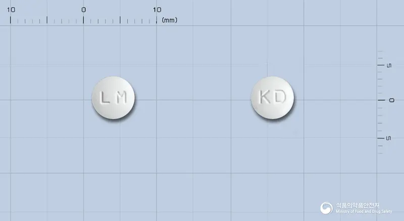 리마알파정(리마프로스트알파덱스) 앞뒤 사진 (흰색 원형, 각인 LM / KD)