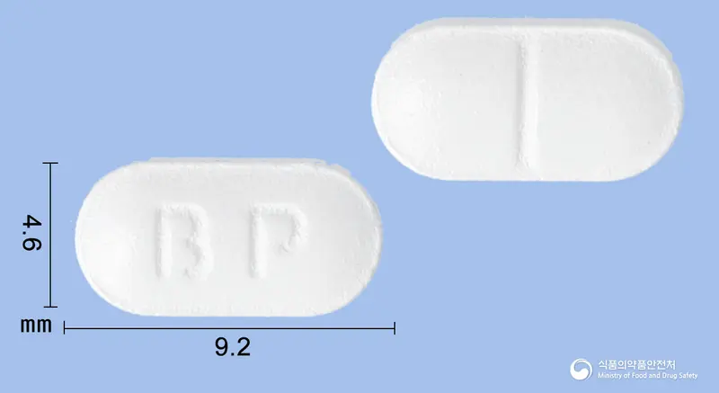 모사드린정(모사프리드시트르산염이수화물) 앞뒤 사진 (흰색 장방형, 각인 BP)