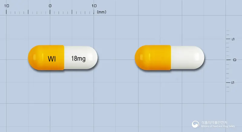 환인아토목세틴캡슐18밀리그램(아토목세틴염산염) 앞뒤 사진 (주황색 캡슐, 각인 WI 18mg)