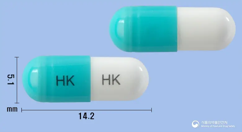 플루나졸캡슐(플루코나졸) 앞뒤 사진 (파란색 캡슐, 각인 HK HK)