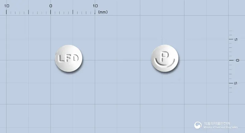 스토티딘정10밀리그램(라푸티딘) 앞뒤 사진 (흰색 원형, 각인 LFD)