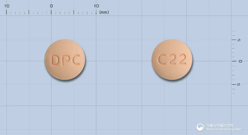 올산플러스정20/12.5밀리그램 앞뒤 사진 (주황색 원형, 각인 DPC / C22)