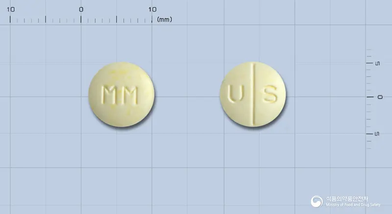 유리카에스정 앞뒤 사진 (노란색 원형, 각인 MM / U S)