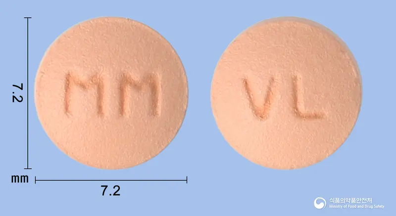 엑스닌정5/80mg 앞뒤 사진 (분홍색 원형, 각인 MM / VL)