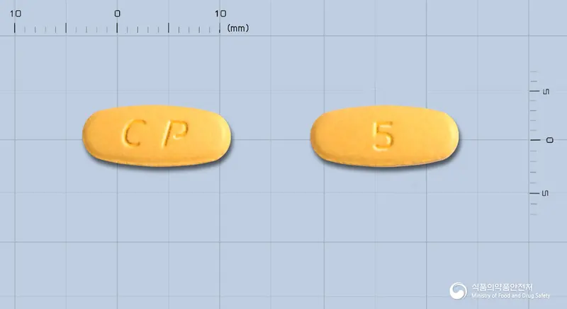 아모르탄정5/160mg 앞뒤 사진 (주황색 타원형, 각인 CP / 5)