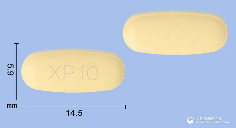 엑스핀탄정10/160밀리그램 앞뒤 사진 (주황색 타원형, 각인 XP10)
