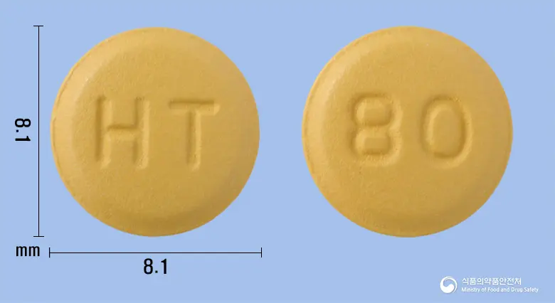 엑스포르테정5/80mg 앞뒤 사진 (주황색 원형, 각인 HT / 80)