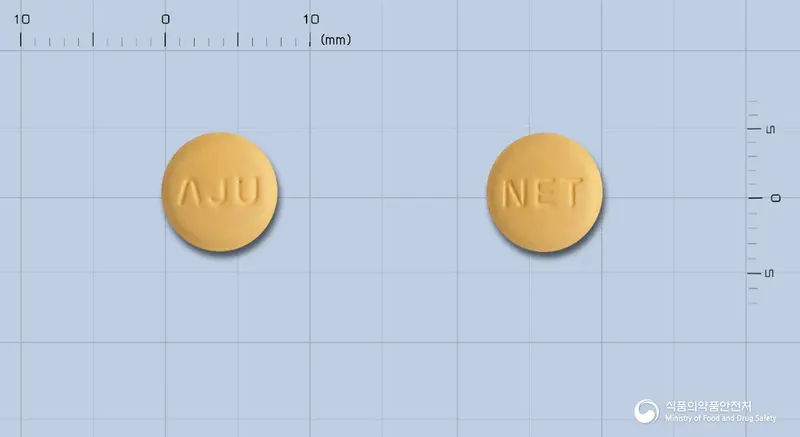 아나퍼지정5/80밀리그램 앞뒤 사진 (주황색 원형, 각인 ΛJU / NET)