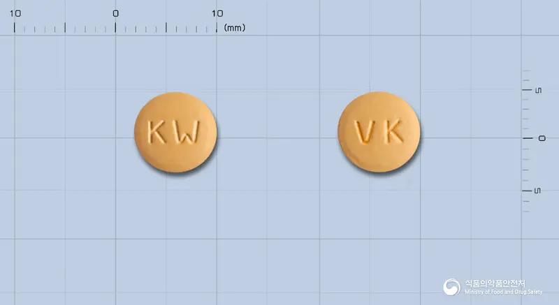 디오노바정5/80밀리그램 앞뒤 사진 (주황색 원형, 각인 KW / VK)
