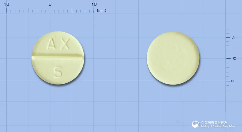 멜로디구강붕해정15밀리그램(멜로시캄) 앞뒤 사진 (노란색 원형, 각인 AX 5)