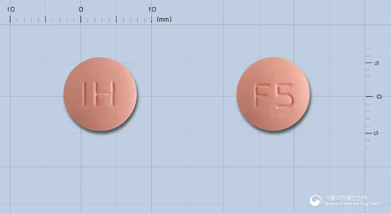 펠로딥정(펠로디핀) 앞뒤 사진 (분홍색 원형, 각인 IH / F5)