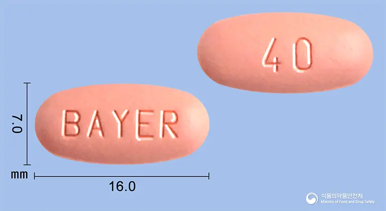 스티바가정40밀리그램(레고라페닙) 앞뒤 사진 (분홍색 타원형, 각인 BAYER / 40)