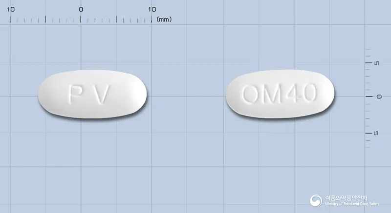 올메브이정40밀리그램(올메사르탄메독소밀) 앞뒤 사진 (흰색 타원형, 각인 PV / OM40)