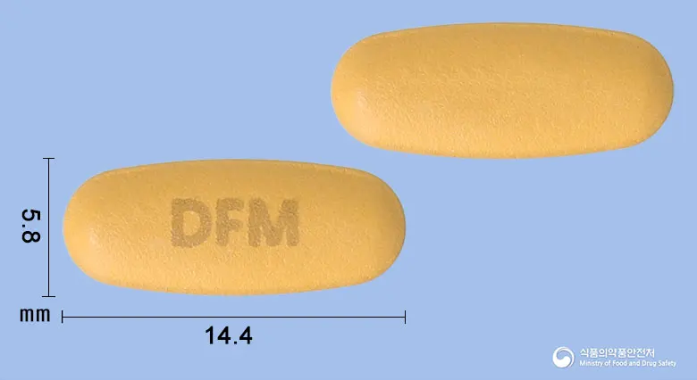 디스포지정5/160mg 앞뒤 사진 (주황색 타원형, 각인 DFM)