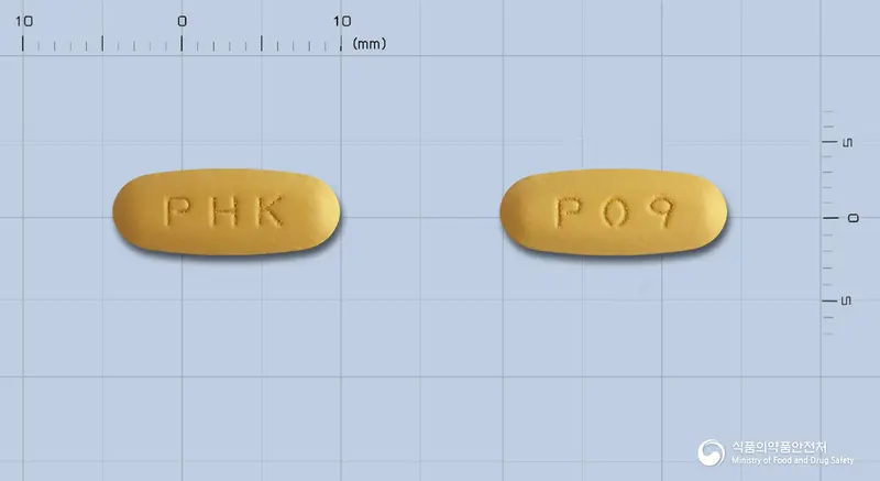 바르사핀정5/160mg 앞뒤 사진 (주황색 타원형, 각인 PHK / P09)