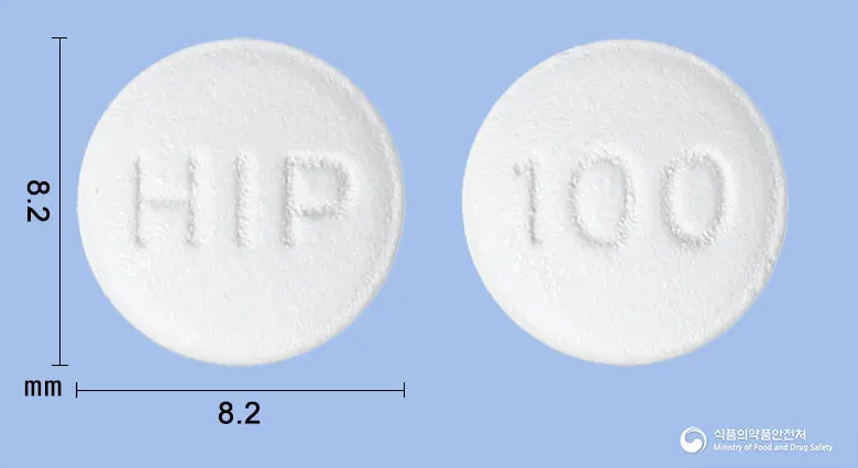 오플라정(오플록사신) 앞뒤 사진 (흰색 원형, 각인 HIP / 100)