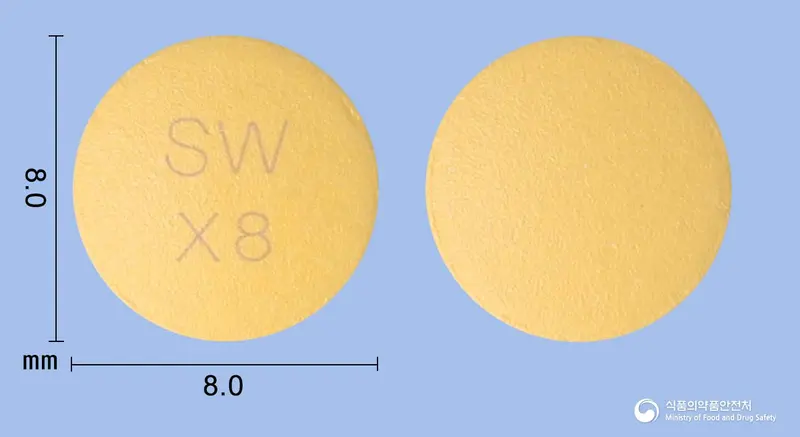 엑스폴정5/80mg(암로디핀,발사르탄) 앞뒤 사진 (주황색 원형, 각인 SWX8)
