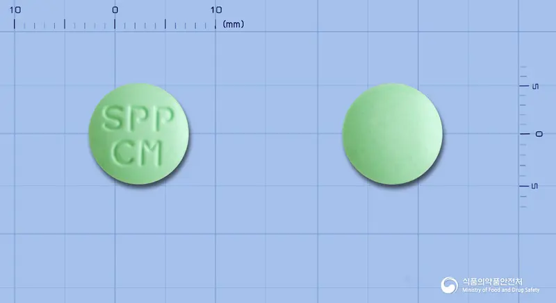 시티딘정200mg(시메티딘) 앞뒤 사진 (연두색 원형, 각인 SPPCM)