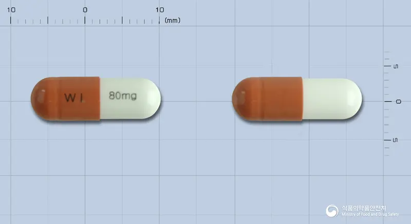 환인아토목세틴캡슐80밀리그램(아토목세틴염산염) 앞뒤 사진 (갈색 캡슐, 각인 WI 80mg)