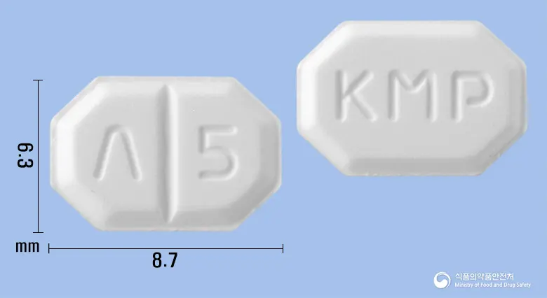 암로닌정(암로디핀베실산염) 앞뒤 사진 (흰색 팔각형, 각인 Λ 5 / KMP)