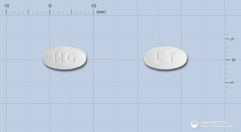 로칼정(로사르탄칼륨) 앞뒤 사진 (흰색 타원형, 각인 HG / LT)