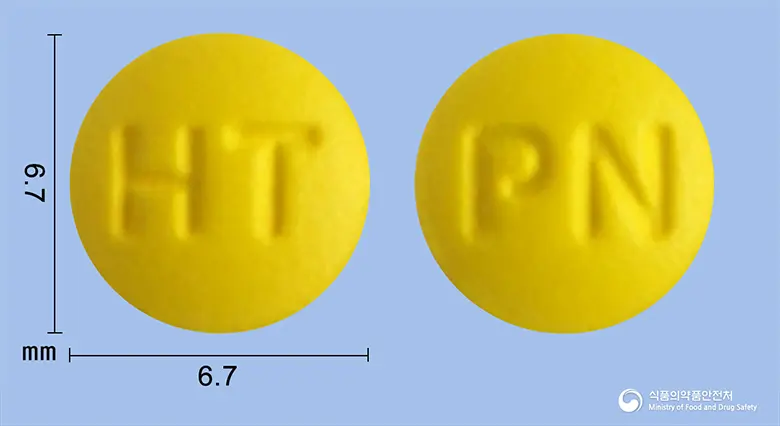 파리나졸정10mg(라베프라졸나트륨) 앞뒤 사진 (노란색 원형, 각인 HT / PN)