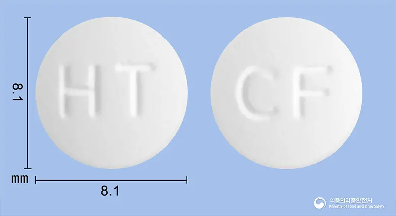 크라프록신정100mg(레보플록사신수화물) 앞뒤 사진 (흰색 원형, 각인 HT / CF)