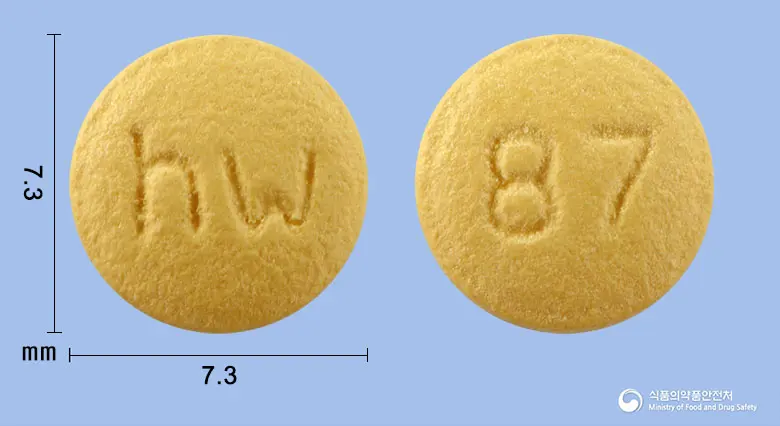 라베스틴정20mg(라베프라졸나트륨) 앞뒤 사진 (노란색 원형, 각인 hw / 87)
