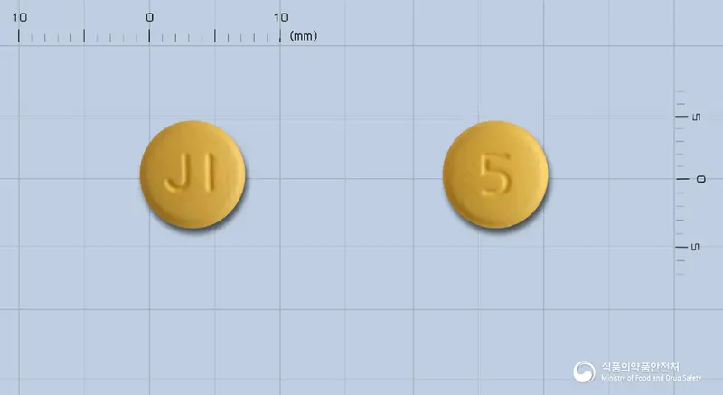 제이포지정5/80밀리그램 앞뒤 사진 (주황색 원형, 각인 JI / 5)
