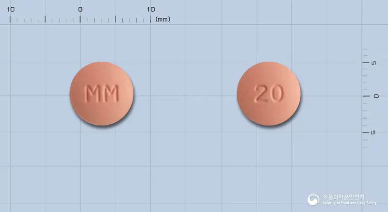 명문로수바스타틴칼슘정20밀리그램 앞뒤 사진 (분홍색 원형, 각인 MM / 20)