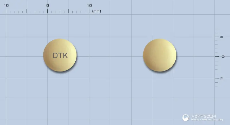 듀아타임코와정 앞뒤 사진 (노란색 원형, 각인 DTK)