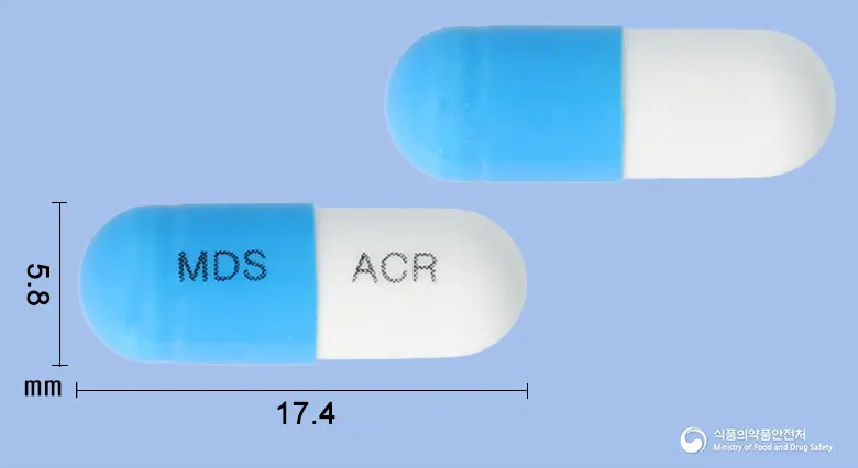 안티클러캡슐(세파클러수화물) 앞뒤 사진 (파란색 캡슐, 각인 MDS ACR)