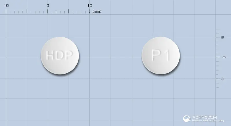 미라프서방정0.375밀리그램(프라미펙솔염산염일수화물) 앞뒤 사진 (흰색 원형, 각인 HDP / P1)