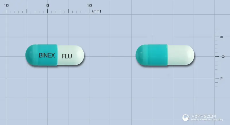 플루스타캡슐(플루코나졸) 앞뒤 사진 (파란색 캡슐, 각인 BINEX FLU)