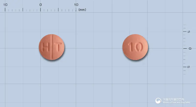크레스바정10mg(로수바스타틴칼슘) 앞뒤 사진 (분홍색 원형, 각인 H T / 10)