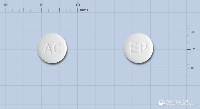 머렉스정(에페리손염산염) 앞뒤 사진 (흰색 원형, 각인 AC / EP)
