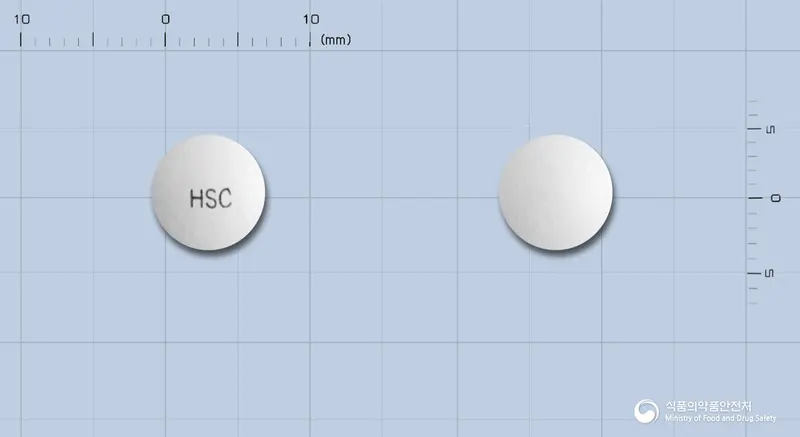 디멜라정 앞뒤 사진 (흰색 원형, 각인 HSC)