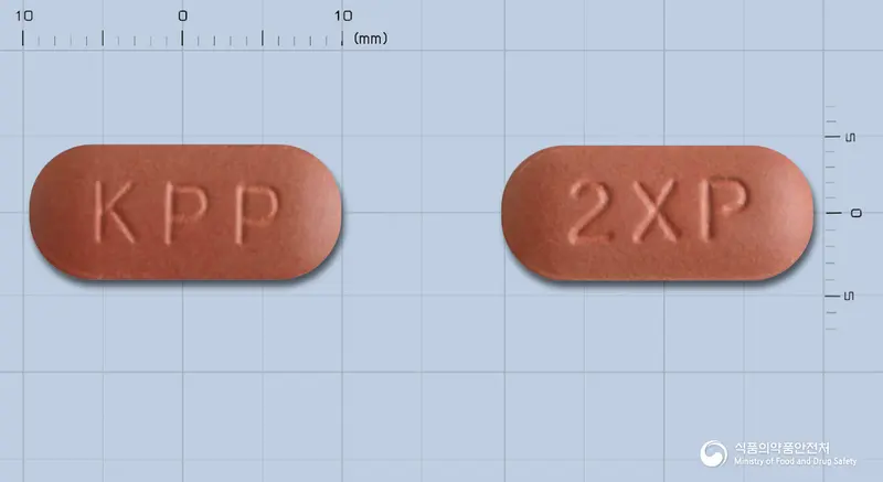 투엑스비프리미엄정 앞뒤 사진 (갈색 장방형, 각인 KPP / 2XP)